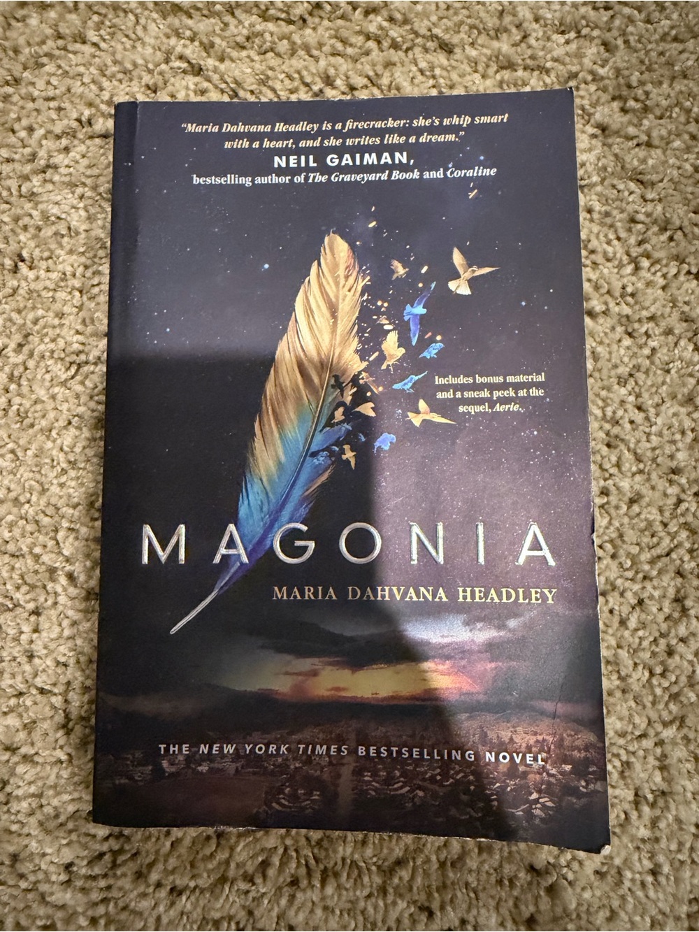 Magonia Hardcover Book - Blue and Gold Feather Cover
